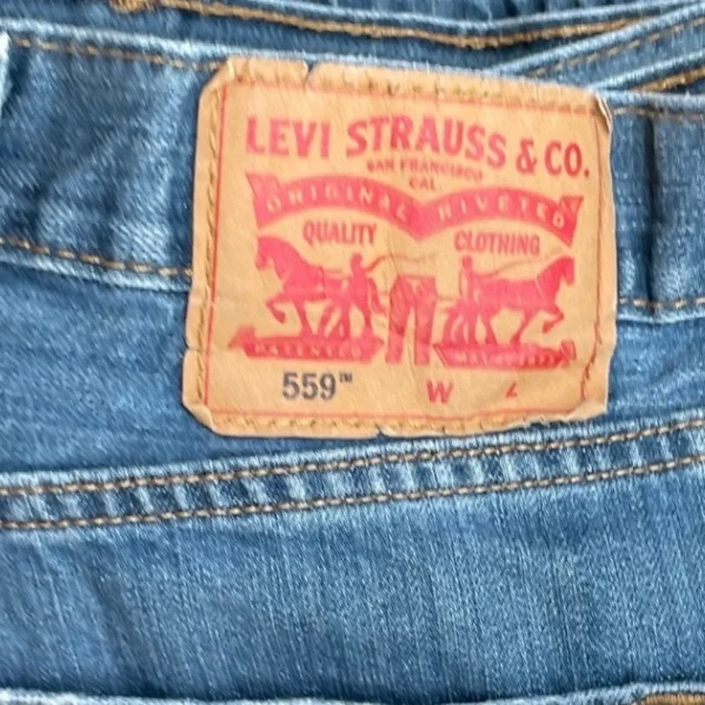 Levi's 559 Relaxed Straight Jeans Mens‎ 50x28* Blue Medium Wash Denim A0302-8